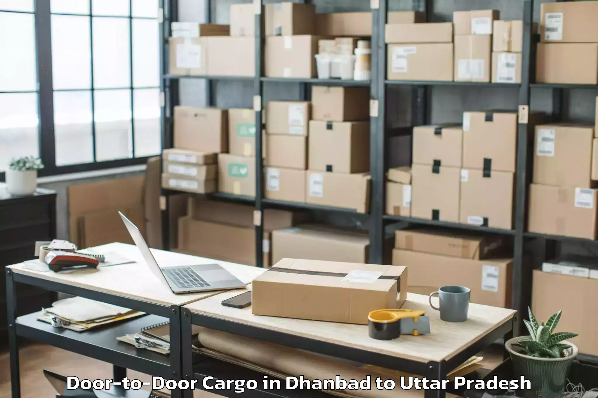 Leading Dhanbad to Bangarmau Door To Door Cargo Provider